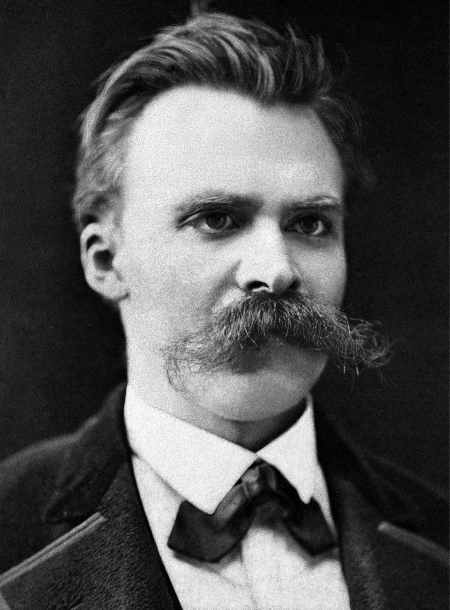 Portret Fryderyka Nietzschego, twórcy idei woli mocy i przewartościowania wartości · źródło: Friedrich Hermann Hartmann, Wikimedia Commons, domena publiczna