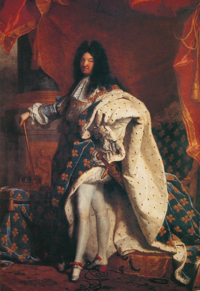 Ludwik XIV — portret Hyacinthe’a Rigauda (1701). „Król Słońce” skupił całą władzę w swoich rękach; przypisuje mu się słowa „Państwo to ja”. · źródło: Hyacinthe Rigaud, Wikimedia Commons, domena publiczna