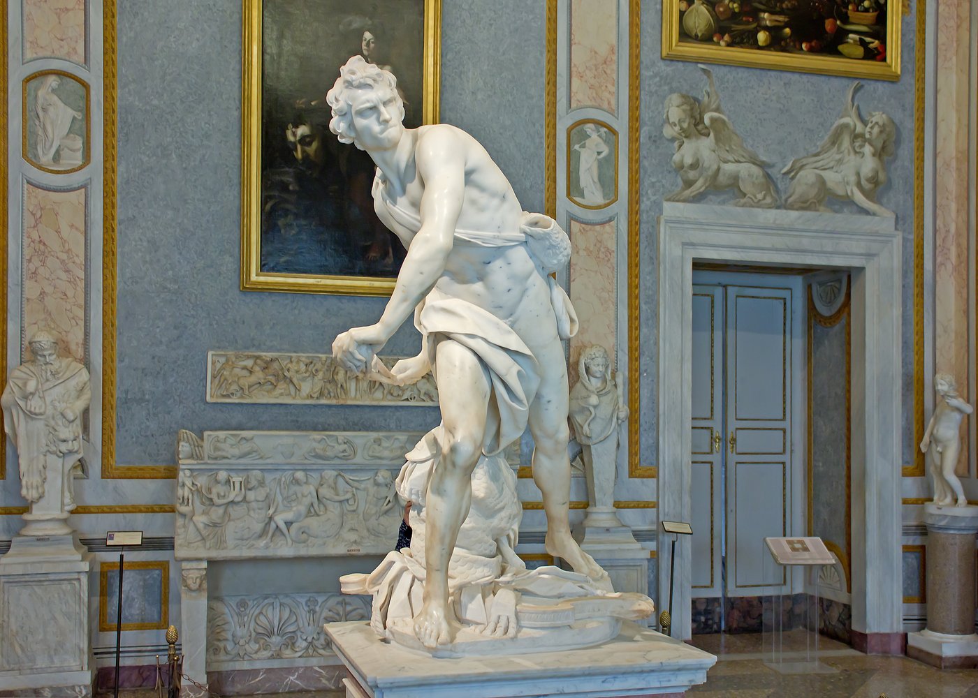 Bernini, Dawid (1623–24, Galleria Borghese) — moment w trakcie walki: skrajne napięcie mięśni i twarzy w ułamku sekundy przed wyrzuceniem kamienia; barok jako akcja · źródło: Wikimedia Commons, CC0