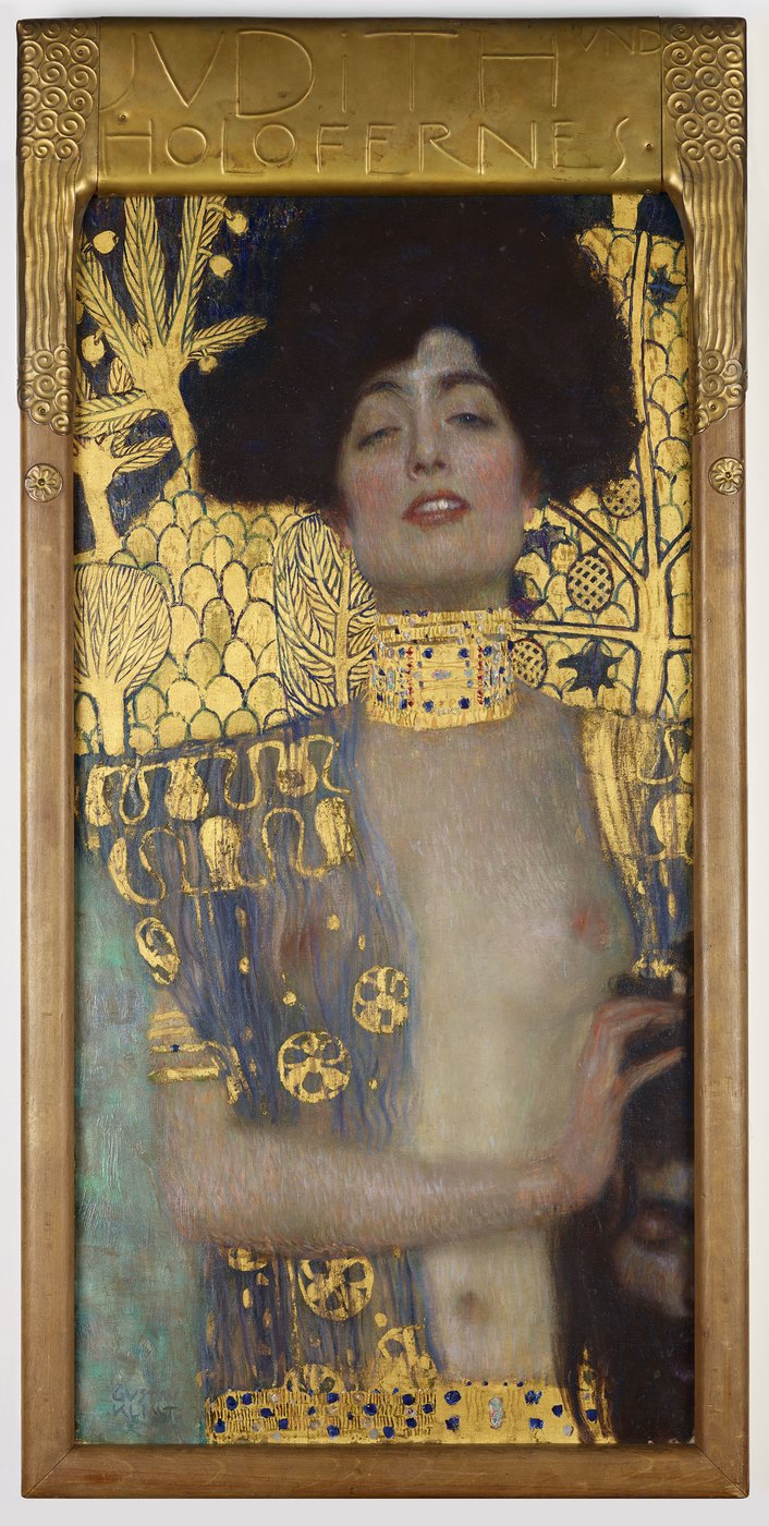Gustav Klimt, Judyta I (1901, Belvedere) — biblijna bohaterka jako femme fatale: zimny, rozkoszujący się wyraz twarzy, odcięta głowa Holofernesa ledwo widoczna · źródło: Gustav Klimt, Wikimedia Commons, domena publiczna