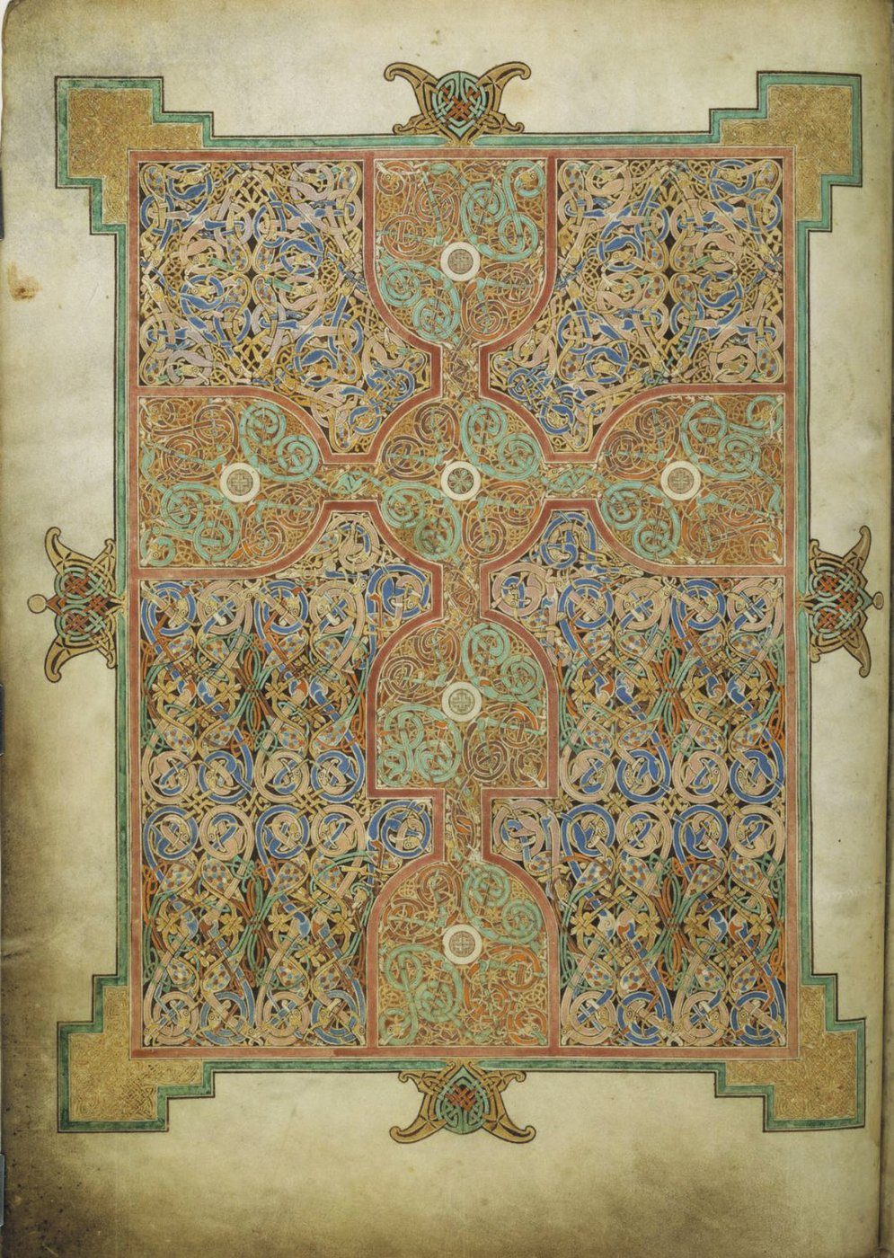 Strona dywanowa z Ewangeliarza z Lindisfarne (ok. 715–720) — labiryntowa plecionka wici i wstążek z krzyżem; szczyt ornamentyki insularno-anglosaskiej · źródło: British Library, Wikimedia Commons, domena publiczna