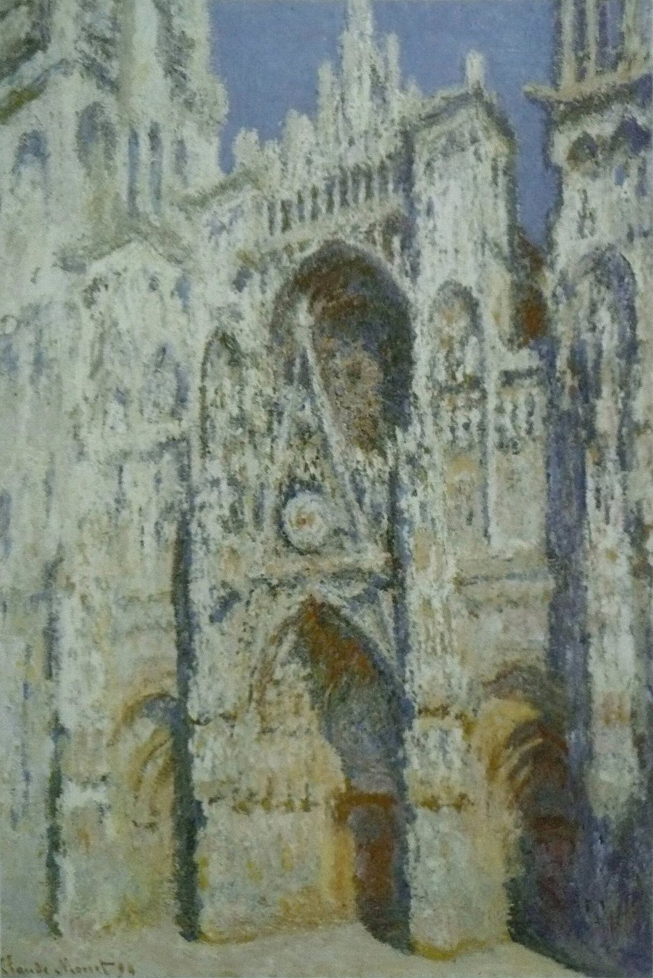 Claude Monet, Katedra w Rouen. Pełne słońce, harmonia błękitu i złota (1893, Musée d'Orsay) — fasada w południowym świetle: cienie zniwelowane, kamień niemal płaski; tematem jest światło, nie architektura · źródło: Claude Monet, Wikimedia Commons, domena publiczna