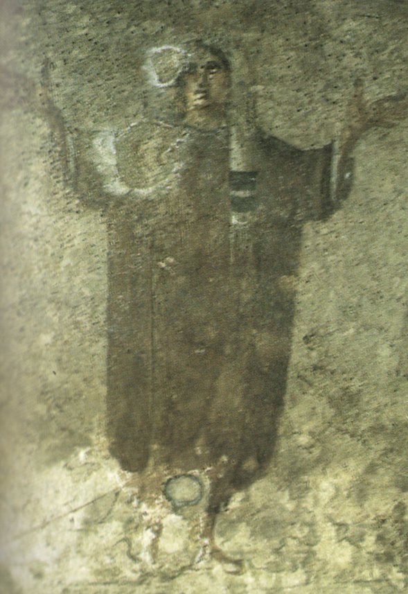 Oranta z katakumb Pryscylli w Rzymie (III w.) — modląca się kobieta z rozłożonymi ramionami; frontalność jako świadoma postawa liturgiczna · źródło: Wikimedia Commons, domena publiczna