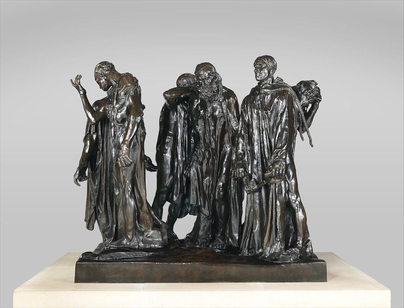 Auguste Rodin, Mieszczanie z Calais (1889, brąz) — sześć figur, każda z innym uczuciem wobec śmierci; bez triumfu i bez wysokiego cokołu — rzeźba na poziomie widza · źródło: fot. The Met, Wikimedia Commons, CC0