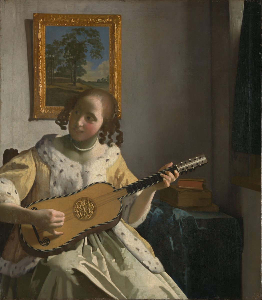 Johannes Vermeer, „Grająca na gitarze" (ok. 1672) — symbol osobistego, kameralnego uczestnictwa w muzyce · źródło: Johannes Vermeer, Wikimedia Commons, domena publiczna
