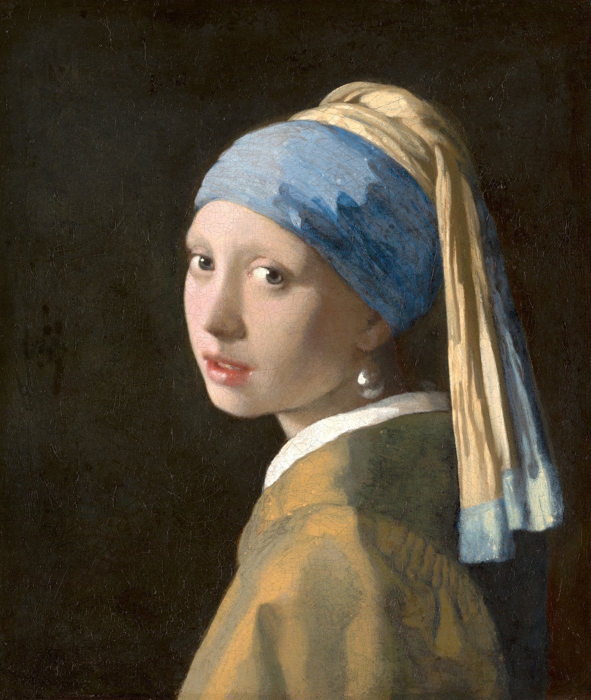 Jan Vermeer, Dziewczyna z perłą (ok. 1665) — kompozycja asymetryczna; ciemne tło jako plama tonalna wyostrza jasność twarzy; punkt ciężkości: oczy i perła · źródło: Johannes Vermeer, Wikimedia Commons, domena publiczna