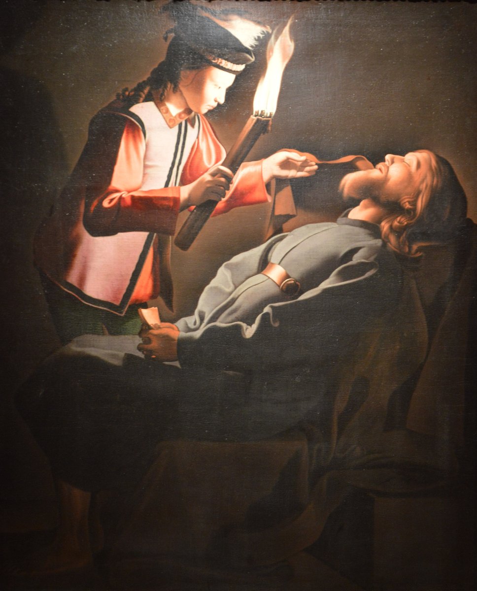 „Odnalezienie św. Aleksego” z pracowni Georges’a de La Tour — martwy asceta rozpoznany dzięki listowi w dłoni · źródło: pracownia Georges’a de La Tour, Wikimedia Commons, domena publiczna