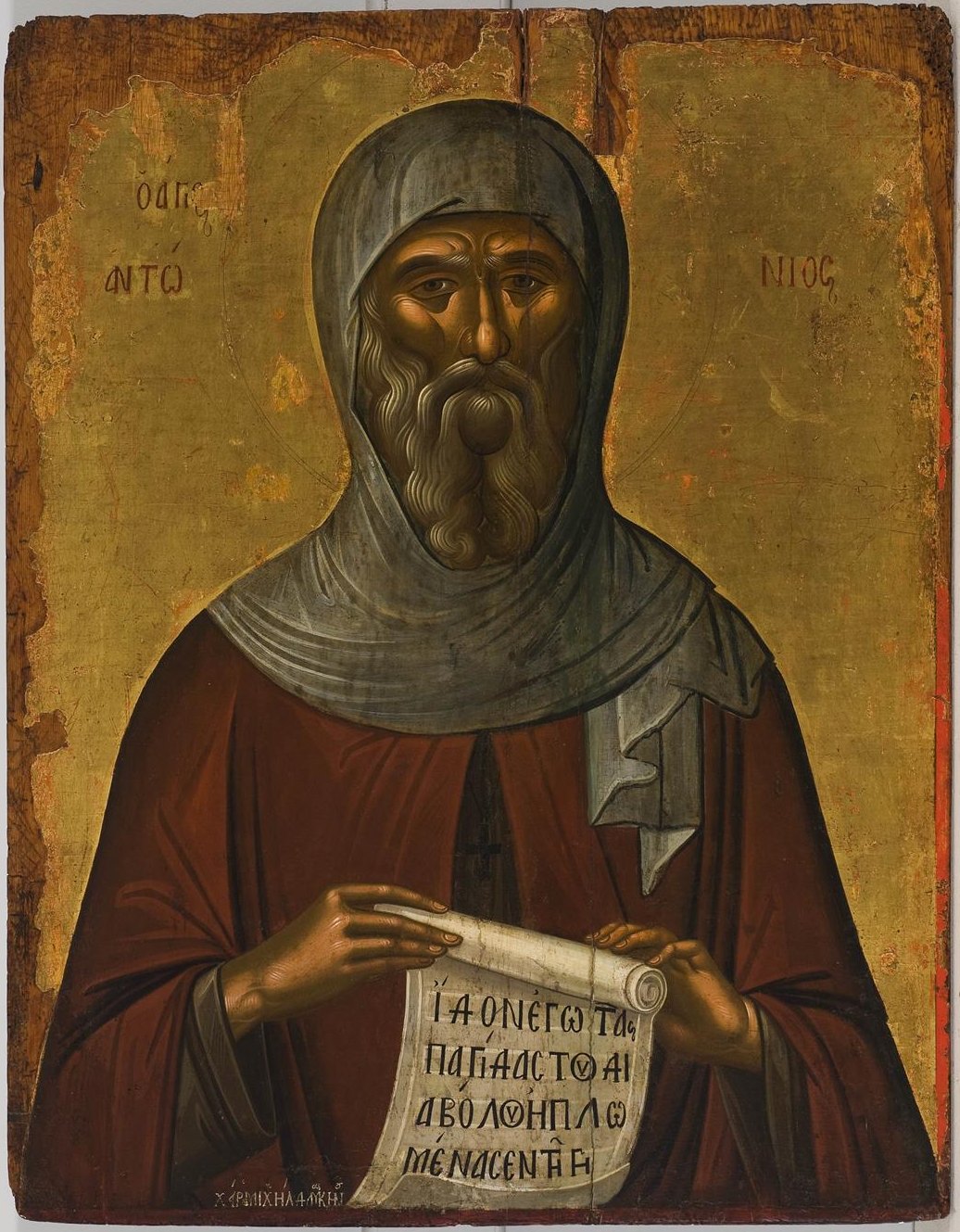 Św. Antoni Wielki — ikona Michaela Damaskinosa (XVI w.): pustelnik w habicie ze zwojem w dłoniach · źródło: Wikimedia Commons, domena publiczna