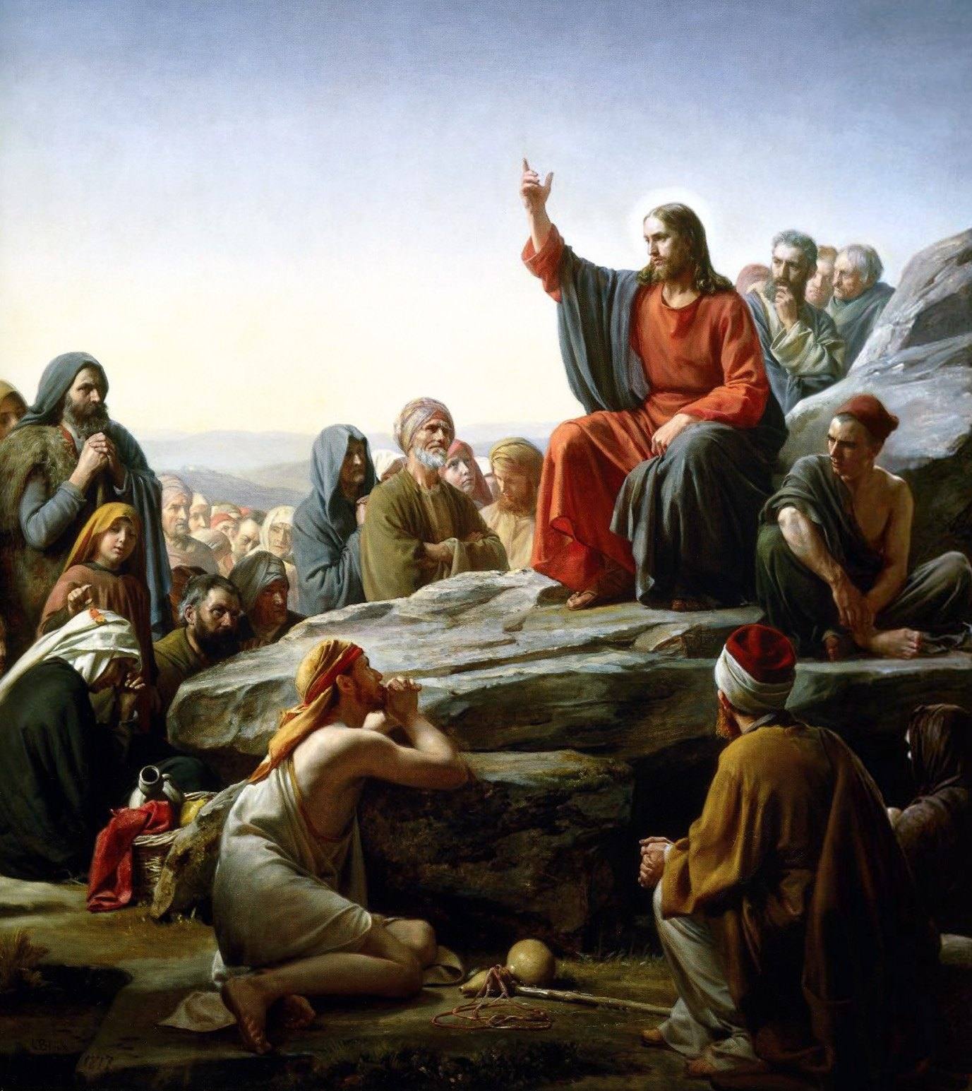 „Kazanie na górze” Carla Blocha (1877): Jezus naucza z uniesioną ręką, siedząc na skale wśród słuchaczy · źródło: Wikimedia Commons, domena publiczna
