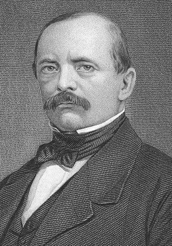 Otto von Bismarck — twórca pierwszego na świecie systemu obowiązkowych ubezpieczeń społecznych (Niemcy, lata 80. XIX w.): ubezpieczenie chorobowe, wypadkowe i emerytalne. Korzeń nowoczesnej polityki społecznej. · źródło: Evert A. Duykinck, Wikimedia Commons, domena publiczna